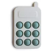 Image de Mushie Pop-It Phone jouet d’activité pour enfant Cambridge Blue 10m+ 1 pcs