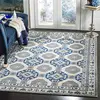 Image de SAFAVIEH Tapis Traditionnel Pour Salon, Salle à manger, Chambre à coucher - Patina Collection, Tapis à poil court, Bleu et Ivoire, 155 X 229 cm