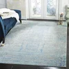 Image de SAFAVIEH Tapis de Sol Vieilli pour Salon, Salle à manger, Chambre à coucher - Mystique Collection, Tapis à poil court, Bleu clair et Multi, 152 X 244 cm