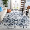 Image de SAFAVIEH Tapis de Sol Vieilli pour Salon, Salle à manger, Chambre à coucher - Madison Collection, Tapis à poil court, Crème et Marine, 91 X 152 cm