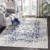 Image de SAFAVIEH Tapis de Sol Vieilli pour Salon, Salle à manger, Chambre à coucher - Madison Collection, Tapis à poil court, Crème et Marine, 155 X 229 cm