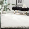 Image de Safavieh Tapis Shag pour Salon, Salle à Manger, Chambre à Coucher - Luxe Shag Collection, Tapis à Poil Long, Ivoire, 200 x 300 cm
