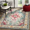 Image de Safavieh Tapis Boho pour Salon, Salle à Manger, Chambre à Coucher - Monaco Collection, Tapis à Poil Court, Bleu Clair et Fuchsia, 122 X 170 cm