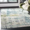 Image de SAFAVIEH Tapis Boho pour Salon, Salle à Manger, Chambre à Coucher - Monaco Collection, Tapis à Poil Court, Bleu et Gris, 155 X 231 cm
