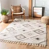 Image de SAFAVIEH Tapis Shag pour Salon, Salle à Manger, Chambre à Coucher - Moroccan Tassel Shag Collection, Tapis à Poil Court, Ivoire et Marron, 122 X 183 cm