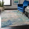 Image de SAFAVIEH Tapis Boho pour Salon, Salle à Manger, Chambre à Coucher - Madison Collection, Tapis à Poil Court, Bleu et Gris, 122 X 183 cm