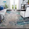 Image de Safavieh Tapis Boho pour Salon, Salle à Manger, Chambre à Coucher - Madison Collection, Tapis à Poil Court, Bleu et Gris, 274 X 366 cm