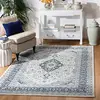 Image de Safavieh Tapis Traditionnel pour Salon, Salle à Manger, Chambre à Coucher - Isabella Collection, Tapis à Poil Court, Crème et Bleu foncé, 160 X 229 cm