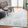 Image de SAFAVIEH Tapis Moderne pour Salon, Salle à Manger, Chambre à Coucher - Capri Collection, Tapis à Poil Court, Beige et Bleu, 183 X 274 cm