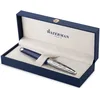 Image de Waterman Carène Stylo plume | Laqué gris métallique et bleu | Capuchon biseauté | Plume moyenne en or 18 carats | Encre bleue | Écrin