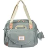 Image de Béaba, Sac à Langer Bébé Genève, Maternité, Grande Contenance, Vert Sauge | Nombreux Rangements, Modulable, Pochette Avant Amovible,Compartiment Repas Isotherme,Attache Poussette,Organisation Optimisée
