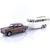 Image de NOREV Peugeot 404 1965 Marron métallisé avec Caravane Hénon 1/18