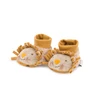 Image de Sous mon baobab chaussons lion Jaune