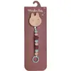 Image de Attache-tétine bois et silicone lapin Multicolore