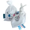 Image de Doudou et Compagnie - Sac à Doudou Lapin UNICEF - 10 Cm Blanc - Idée Cadeau de Naissance Fille et Garçon - Garantie Doudou Perdu - DC3715