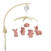 Image de Honey & Hop Mobile musical en bois Terre de sienne