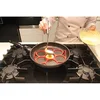 Image de Moule silicone 7 blinis pancakes pour poêle noir Patisse