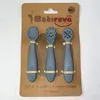 Image de Set de 3 cuillères d'apprentissage en silicone Gris