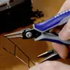Image de Knipex 34 32 130 pour lélectronique et la mécanique de précision Pince à bouts ronds droite Acier Chrome-Vanadium pour roulement à billes 135 mm