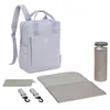 Image de LÄSSIG Sac à langer Sac à dos avec matelas à langer, fixation pour poussette et porte-bouteille Durable/GRE Vividal Backpack cord lilac