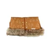 Image de Moufles pour poussette ocre motif girafe - Noukie's