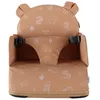 Image de NOUKIE'S - Rehausseur caramel Bébé de 9 mois à 3 ans Chaise Enfant avec Dossier et Coussin- Léger, Pliable et Nomade - Harnais, Sécurité - Imperméable, Déhoussable et Lavable - Max 13 kg - Voyage
