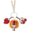 Image de Lilliputiens - Hochet d'Activités Bébé Jack le Lion - Avec Anneau de Dentition en Silicone, Miroir et Hochet - Forme de Trousseau de Clés - 25 x 20 cm - Dès 3 mois