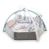 Image de Arche de jeu MoMi PASTEL avec tapis rampant 3 en 1 pour bébé dès la naissance, tapis d'activité sensorielle avec 2 arches, bain de balles, 5 jouets, 20 balles avec sac