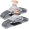 Image de SONGMICS Lot de 30 Cintres, en Plastique de qualité, résistants, antidérapants, en Forme de S, Gain de Place, épaisseur 0.5 cm, Crochet Rotatif en Rose Gold, Largeur 41,5 cm, Gris CRP43G30