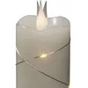 Image de Konstsmide Bougie à piles fine sans flamme - Lumière vivante 3D - Fonctionne avec des piles - Cire blanche crème véritable - Micro guirlande lumineuse - Minuterie de 4 ou 8 heures - 12,7 x 5 cm