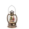 Image de Lanterne à bille LED Konstsmide 3497-000 Père Noël, avec minuterie de 5 h, remplie d'eau, blanc chaud, à piles, intérieure, scène du père Noël, diamètre 12,7 cm