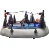 Image de Konstsmide 4254-000 Scène LED « Patinoire », avec Musique, Fonction énergétique au Choix, 12 diodes colorées, Fonctionnement sur Piles et USB, intérieur, câble Noir, 3 Piles AA 1,5 V (Non incluses)