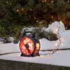 Image de Konstsmide Guirlande lumineuse micro LED avec enrouleur de câble - Noir et rouge - 600 diodes ambre - Transformateur extérieur 30 V - 6 W - Câble souple noir