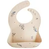 Image de mushie Bavoir Bébé en Silicone | Bavoirs Imperméables Réglables | Bavoirs Faciles à Essuyer | 4 Tailles Réglables Avec Poches Avant Profondes | 100% Sans BPA et Phtalate | Lilac Flowers