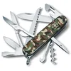 Image de Victorinox Huntsman Couteau de Poche Suisse, Léger, Couteau Multifonction, 15 Fonctions, Grand Lame, Tire Bouchon, Ouvre Boite, Camouflage