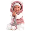 Image de La joyeuse Mimi est une poupée de 42 cm de haut aux yeux bleus et au corps doux. La tête, les bras et les jambes sont en vinyle