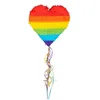 Image de Boland 30965 - Piñata à tirer en forme de coeur arc-en-ciel - Dimensions : 37 x 36 x 7,5 cm - À remplir avec des bonbons et des confettis - Pour fête, anniversaire, cadeau