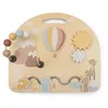 Image de Jollein Busy Board à partir de 1 an - Planche d'activités en Bois - Jouet de motricité - Favorise la motricité Fine et la Coordination oeil-Main - Jouet en Bois - Certifié FSC - Jollies