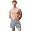 Image de Calvin Klein LV00N61109 Short de Surf pour Homme avec Cordon de Serrage Moyen, Gris (Quarry), XL, Gris (Quarry), XL