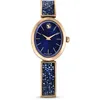 Image de Swarovski Montre Crystal Rock Oval apprêtée d'un bracelet en métal serti d'un pavage de cristaux bleus, en placage de ton or rose