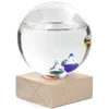 Image de KIKKERLAND Thermomètre Galileo, étiquettes métalliques Dites à la Fois Celsius et Fahrenheit, Globe en Verre, Base en Bois de hêtre, Transparent 11x12x15,8cm