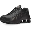 Image de Nike Homme Shox R4 Sneaker, Multicolore (Black/Black/Black/Max Orange 000), 42 EU
