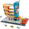 Image de Matchbox Centre de Transport Coffret véhicules et jeu 5 étages, fonctions activées par les enfants et les voitures, inclut un taxi, un bateau et un hélicoptère à l’échelle 1/64, ainsi qu’un accessoire de restauration, HXL47