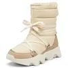 Image de SOREL Bottes mi-hautes imperméables Kinetic Impact NXT pour femme, Blanc miel/brun poudré, 40.5 EU