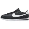 Image de Nike Homme Cortez Textile Road-Running-Shoes, Black White, 45 EU