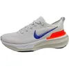 Image de Nike Femme Zoom MX Invincible RN FP Chaussure de Course sur Route, Multicolore, 40 EU