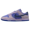 Image de Nike Femme W Dunk Low SE Sneaker, Hortensias Bleu Roi Profond, 44 EU