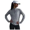 Image de Nike Swift HQ0499-084 Dri-Fit Haut de Course UV avec Demi Fermeture éclair pour Femme, Gris fumé/argenté réfléchissant, Taille XL