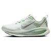 Image de Nike Nike Vomero 18 Chaussures de course sur route pour femme, Barely Green Metallic Silver Steam, 41 EU