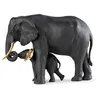 Image de LLADRÓ Figurine en Porcelaine Montrant Le Chemin en Noir et Détails Dorés. Sculpture d'Éléphant Africain de la Collection Origami.
